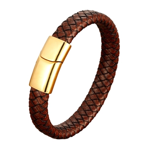 Braided brown leather bracelet for men featuring a polished gold magnetic clasp on white background