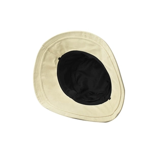 Detail of cotton bucket hat featuring an adjustable inner drawstring and dual-color lining