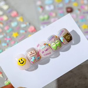 3D embossed pixel art nail stickers with cartoon smiles and alphabet letters