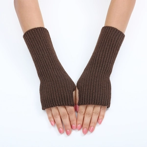 Detailed view of brown knit fingerless gloves with a stylish striped texture and ribbed cuffs