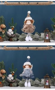 Close-up of handmade Christmas angel plush ornaments with sequins and knitted hats