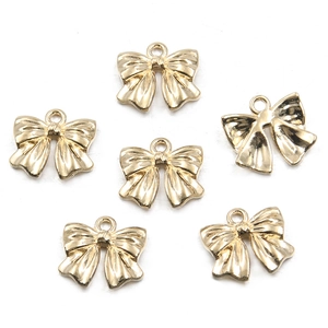Set of six gold hollow bow charms for DIY jewelry making and necklace accessories