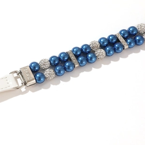 Detail of royal blue pearl pet collar with crystal spacers and engraved silver buckle