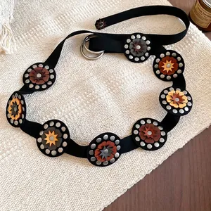 Vintage bohemian black leather waist chain with geometric floral metal discs and silver studs