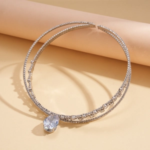 Elegant double-layer silver choker necklace featuring a sparkling pear-shaped zircon pendant