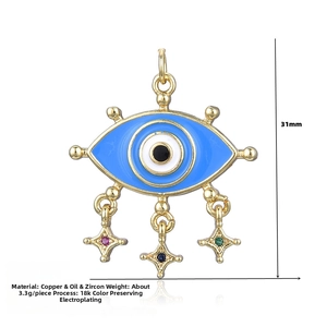 Detail of evil eye pendant with star fringe charms and colorful cubic zirconia inlay
