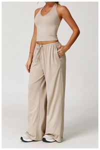 Detail of oat beige yoga set showing drawstring waistband and soft brushed texture fabric