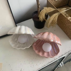 Creative ceramic shell night light with iridescent pearl bulb for bedside table decor