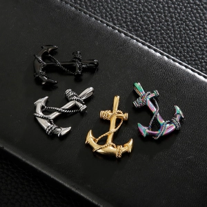 Set of four stainless steel anchor pendants with rope details in diverse metallic finishes