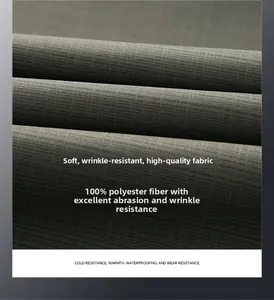 Dettaglio del tessuto grigio 100% poliestere con trama micro-griglia e finitura impermeabile