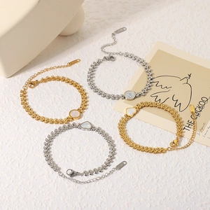 Bracciale in acciaio inossidabile 18k con maglia a spiga e inserti in madreperla bianca