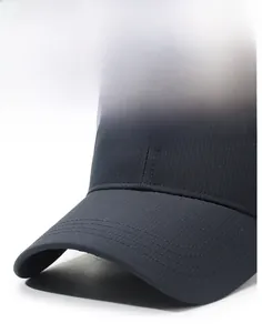 Close-up of a navy blue baseball cap with sport peak logo and fine twill texture