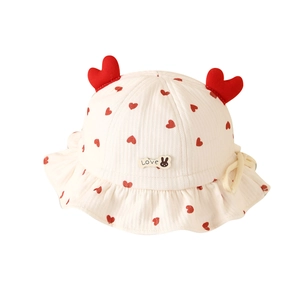 Infant girl's autumn cotton bucket hat with red heart prints and adjustable tie strap