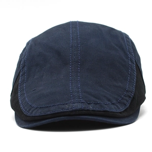Classic navy cotton beret cap with black side patchwork and contrast stitching detail