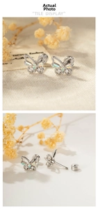 Detail of butterfly stud earring featuring colorful opals and secure screw back closure