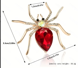 Spider brooch size guide showing dimensions 5.3cm x 5.5cm and red crystal detail