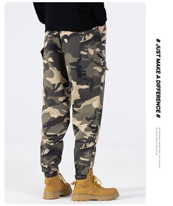 Rear view of camo cargo pants featuring large side pockets and elasticized ankle cuffs