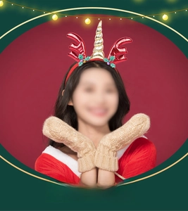 Detail of Christmas headband with red glitter antlers and golden unicorn horn