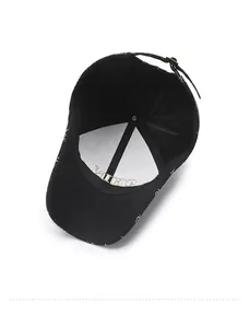Detail of adjustable metal buckle and gold China embroidery inside the black baseball cap