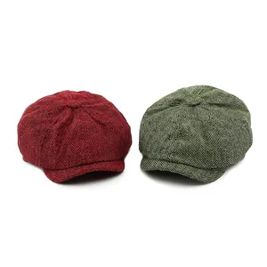 Retro herringbone newsboy caps in red and olive green wool blend with octagonal design
