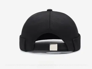 Rear view of black cotton docker cap showing adjustable silver metal buckle detail