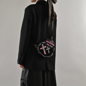 Y2K heart-shaped crossbody bag with punk rivets, metal chains, and baby lettering