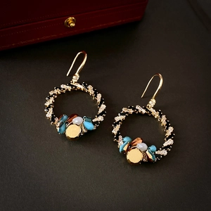 Vintage gold crystal wreath drop earrings with amber and blue stones in a gift box