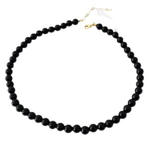 Minimalist black agate beaded necklace with gold lobster clasp on white background