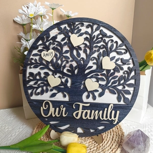Detailed view of Our Family wooden tree plaque with personalized heart name tags