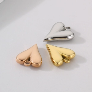 Polished heart pendants in silver, gold, and rose gold finish with top connector rings