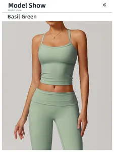 Detail of cross-back yoga bra and high-waist leggings set in matte Basil Green