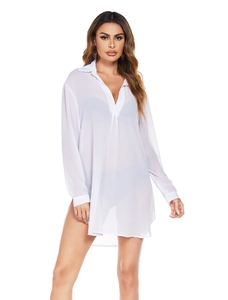Detailed view of white chiffon beach cover up featuring deep V-neck and side slits
