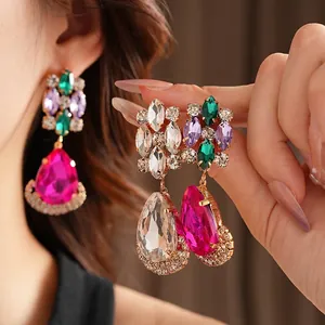 Vintage gold-plated drop earrings with colorful crystals and teardrop pendants