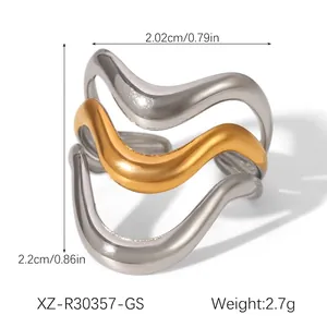 Detail of two-tone gold and silver irregular wave layered open ring for women