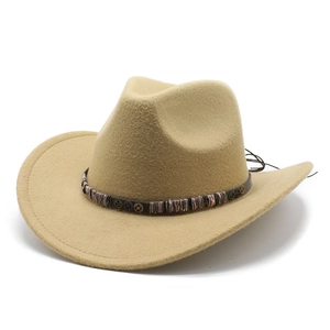 Detailed close-up of khaki cowboy hat with ethnic woven band and metal gear ornaments