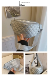Detailed view of silver quilted children's waist bag with adjustable grey strap