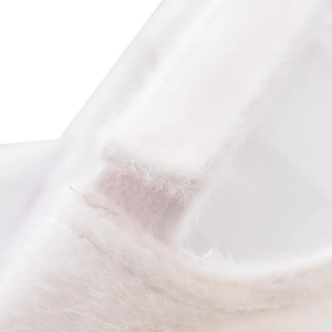 Detail of soft white faux rabbit fur baseball cap showing adjustable strap and texture