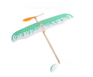 Detail view of DIY rubber band powered glider kit with foam wings and propeller
