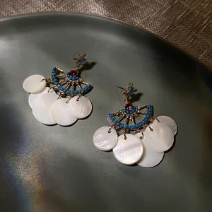Bohemian geometric fan-shaped tassel earrings with gold plating and seashell discs