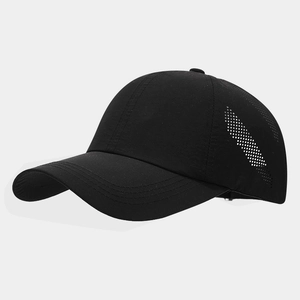 Detail view of black breathable baseball cap with laser-cut side ventilation holes