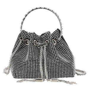 Mini rhinestone bucket bag in black with drawstring closure and metal chain strap