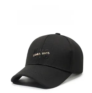 Close-up of black baseball cap featuring detailed NYC and LAMEA HATS letter embroidery