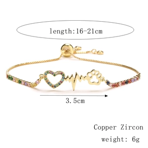 Detail of adjustable heart bracelet with colorful cubic zirconia and EKG line