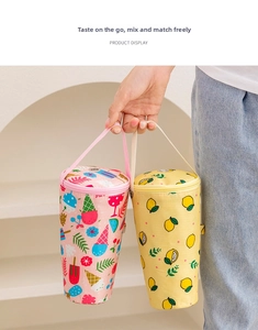 Detail of cute insulated cup sleeves with ice cream and lemon prints and zippers