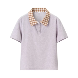 Detail shot of lilac polo top with plaid collar and size S tag on high-quality fabric