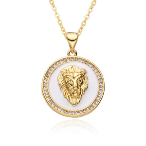 Close-up of gold lion head pendant necklace with sparkling crystal rhinestones inlay