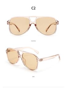 Detail view of transparent pink pilot sunglasses with light brown lenses and double bridge