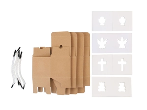 Flat lay of DIY kraft paper gift box set with white handles and hollow decorative cards
