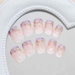 Short square press-on nails with lavender French tips and colorful candy paint dots