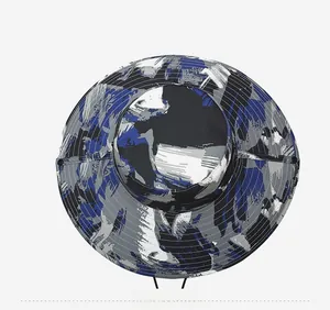 Top view of camouflage outdoor sun hat showing waterproof fabric and wide brim details
